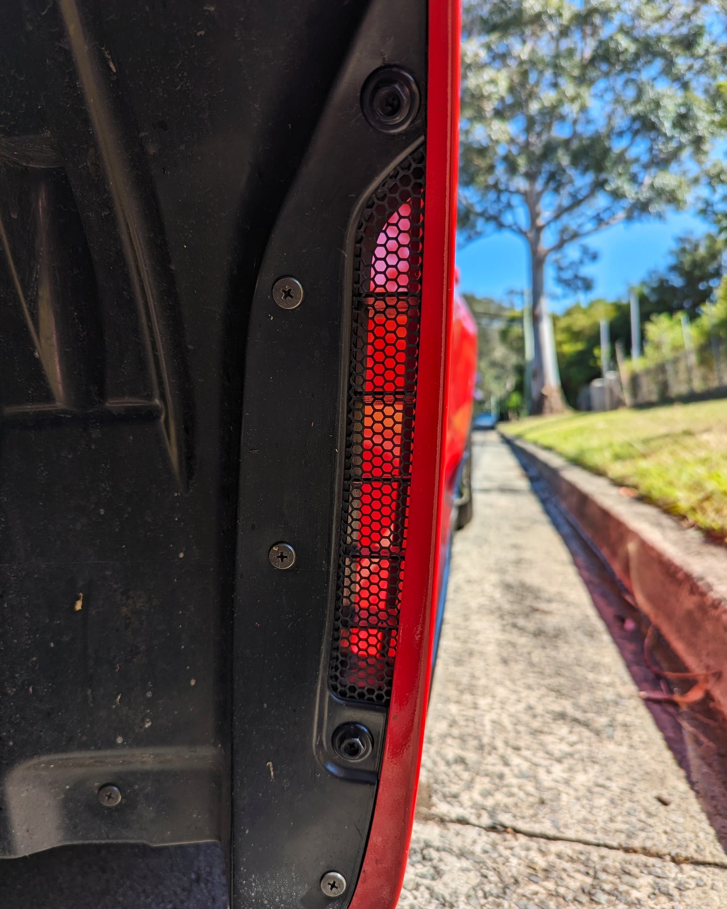 ALPLUS Aero Guard Carbon on Red FL5 inside wheel well